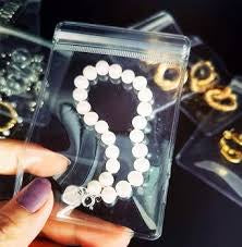 100pcs Clear PVC Transparent Zip Lock Jewelry Bag Small Size Dust Proof Airtight Jewelry Pouch Plastic Zipper Bag Self Seal PVC Packing Pouch Organizer Storage Bags for Rings Earrings Bracelet